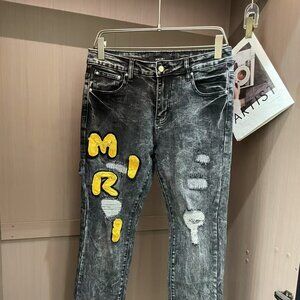 amiri men's washed and ripped slim fit jeans